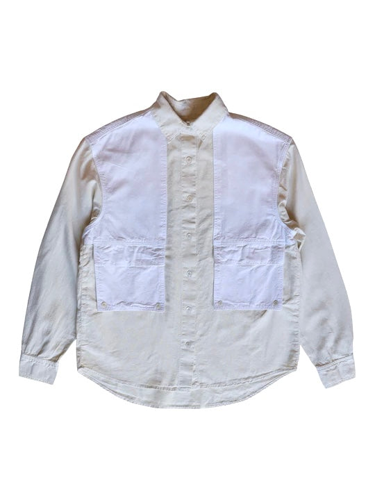 Front product view of the white Trek Shirt with four utility pockets.