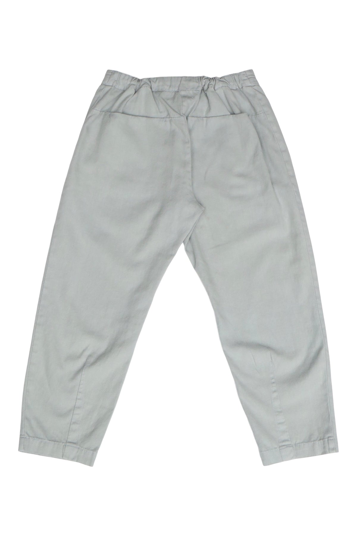 Back product view of pale gray Canvas Souk pants with an elastic waistband.