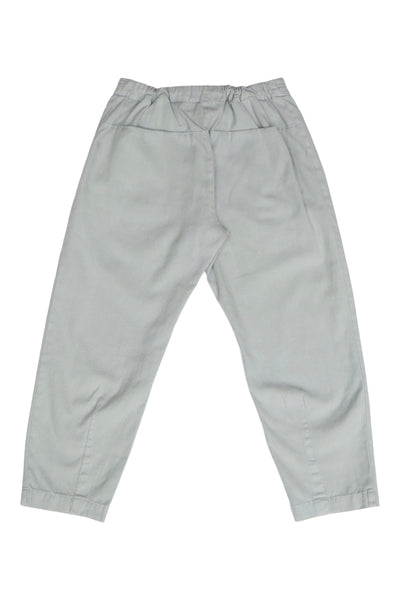 Back product view of pale gray Canvas Souk pants with an elastic waistband.