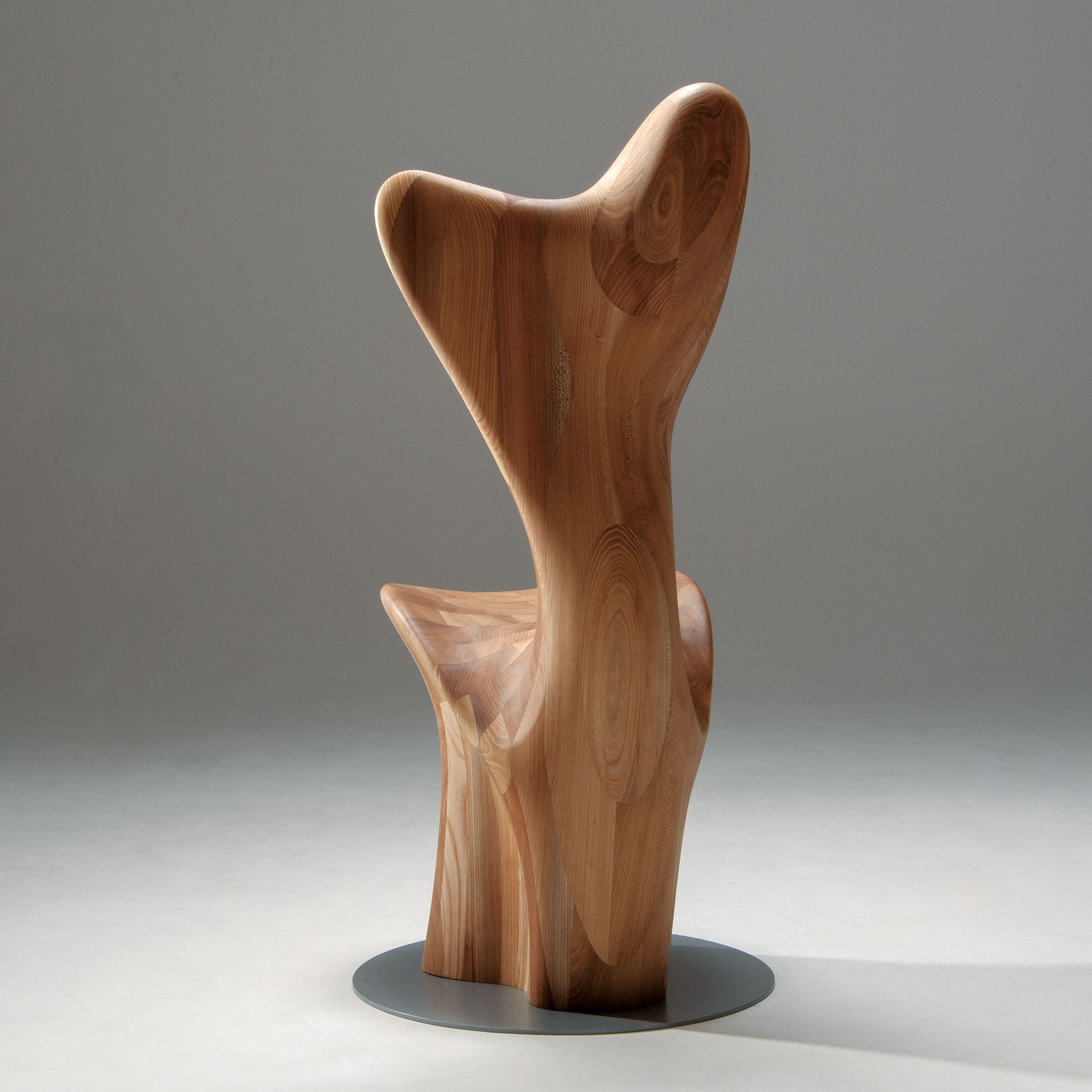 Back view of HUG Chair by CondeHouse with metal base finish