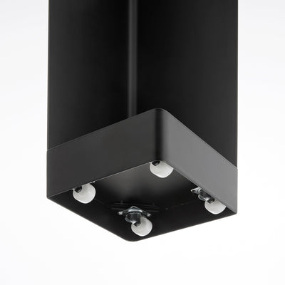 Underside view of the black Yamazaki Home Rolling Bathroom Organizer - Steel, revealing small white caster wheels beneath the square black base.