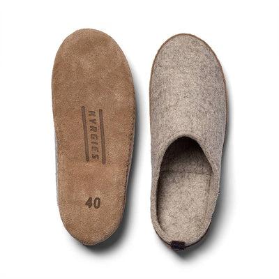 Kyrgies wool slides showing natural wool upper and vegetable-tanned leather sole