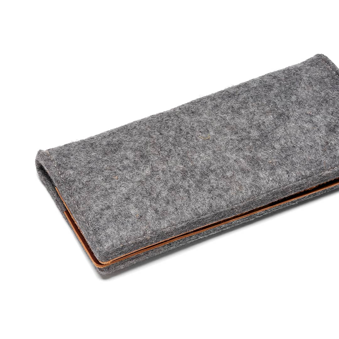 Kyrgies Travel Wallet, grey wool felt, closed side angled view