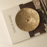 Luna Brass Plate on book