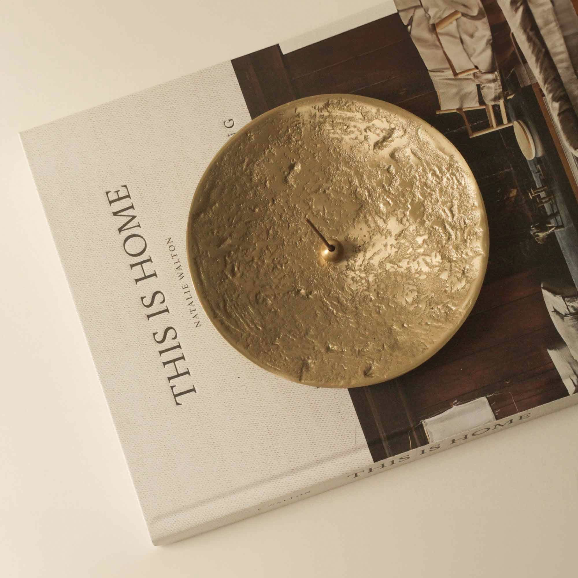 Luna Brass Plate on book