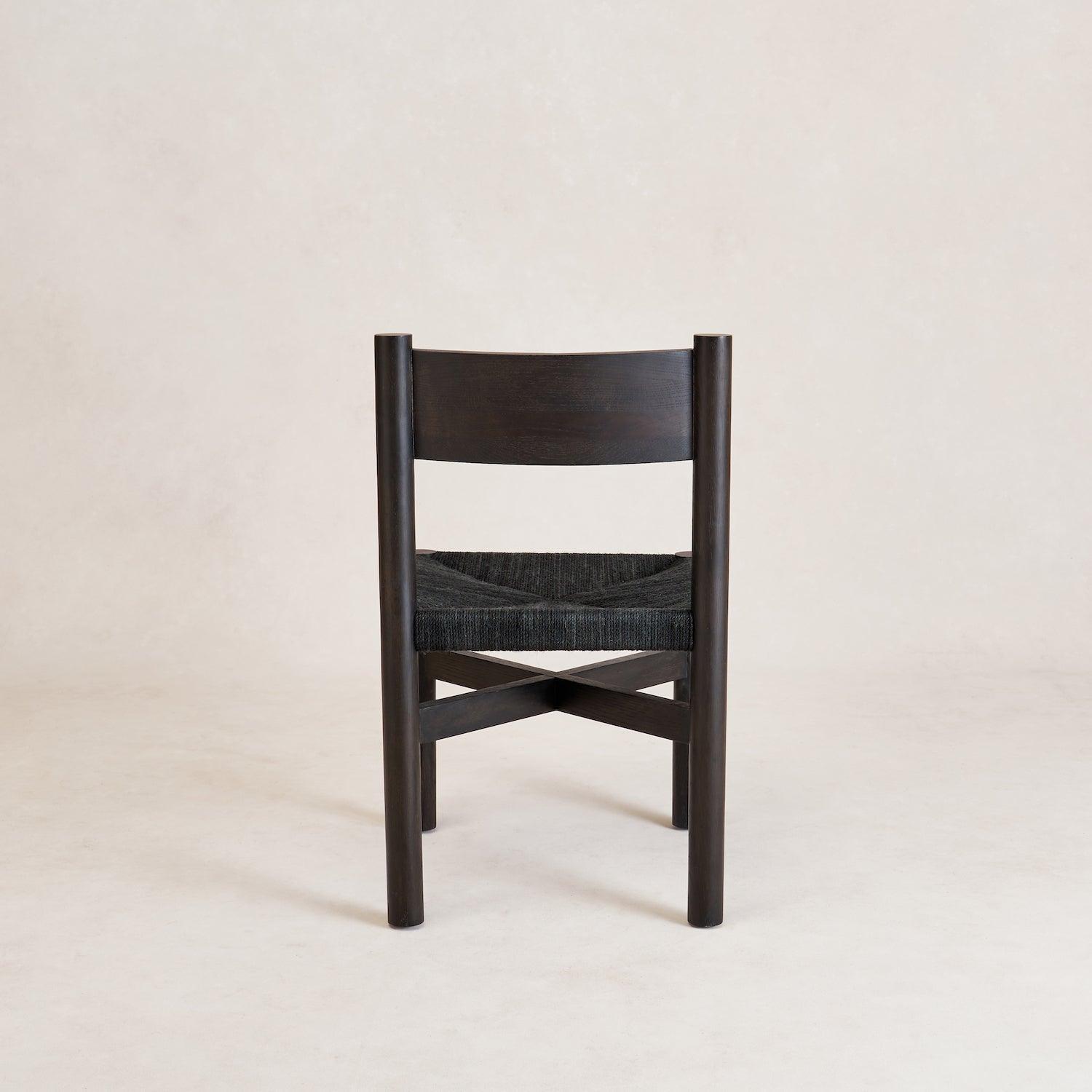 Detail of woven jute seat on black Nonna dining chair