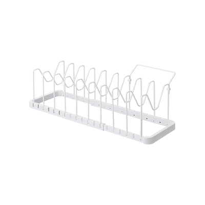 Black Yamazaki Home Adjustable Pot Lid Organizer - Steel holding silver-toned pans and glass lids on a pale background, with a badge reading The Knot Registry Awards 2026.