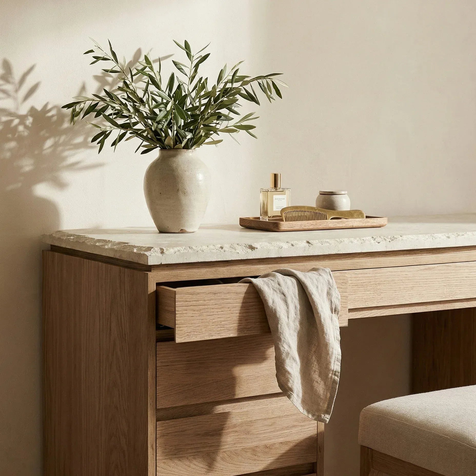 Ojai vanity desk drawer detail in white oak with marble top styled in bedroom