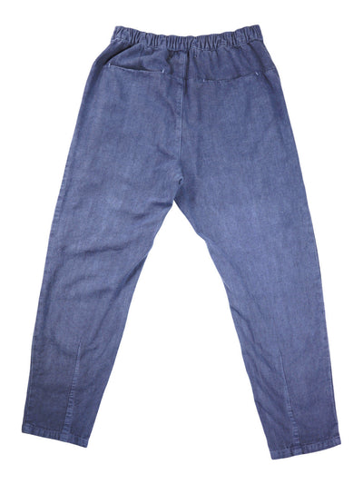 Back product view of blue Canvas Souk pants with an elastic waistband.