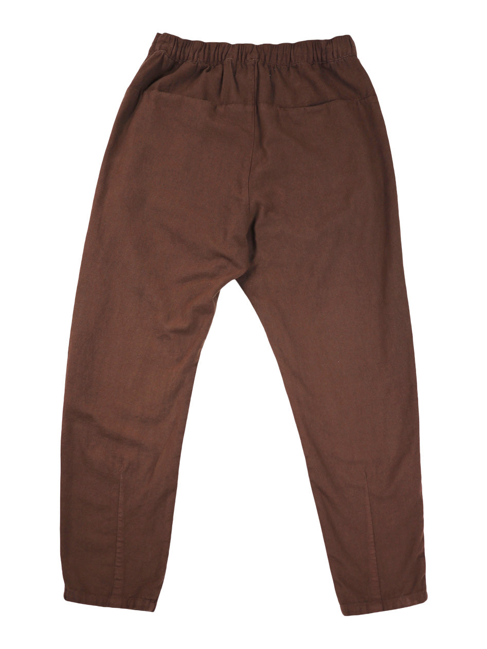 Back product view of brown Canvas Souk pants with an elastic waistband.