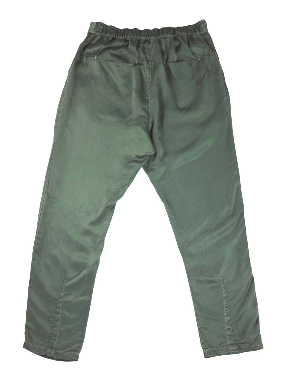 Back product view of sage green Souk pants with an elastic waistband.