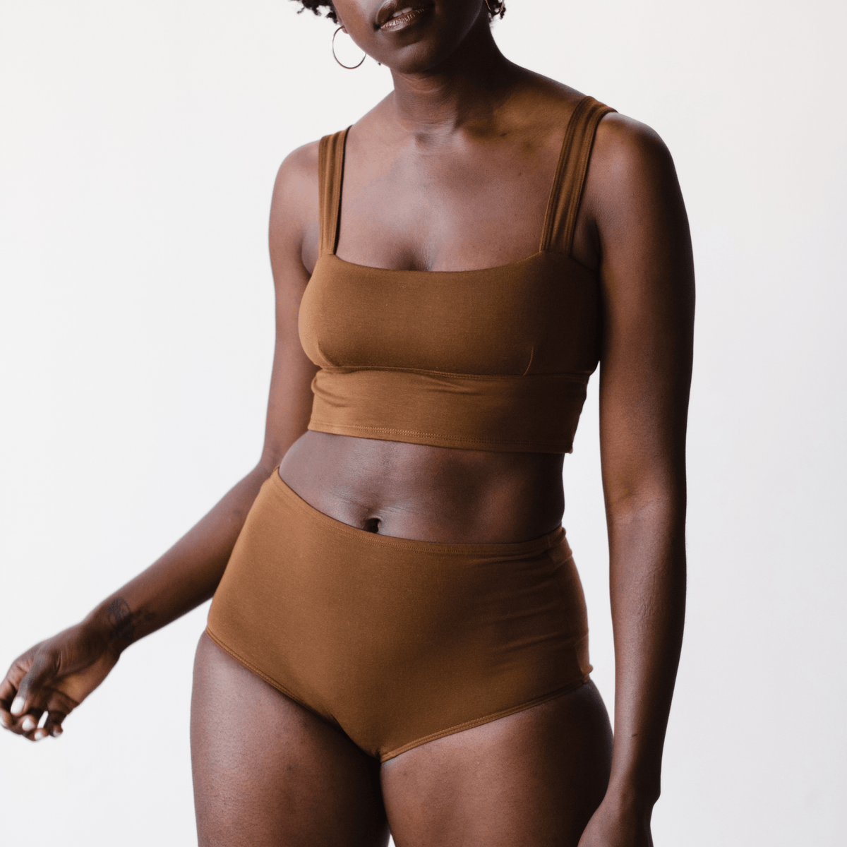Model wearing PROCLAIM Organic Cotton Square Neck Bralette in Ella Nude, front view