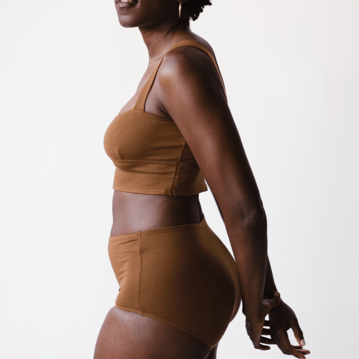 Side view of model wearing PROCLAIM Organic Cotton Square Neck Bralette in Ella Nude