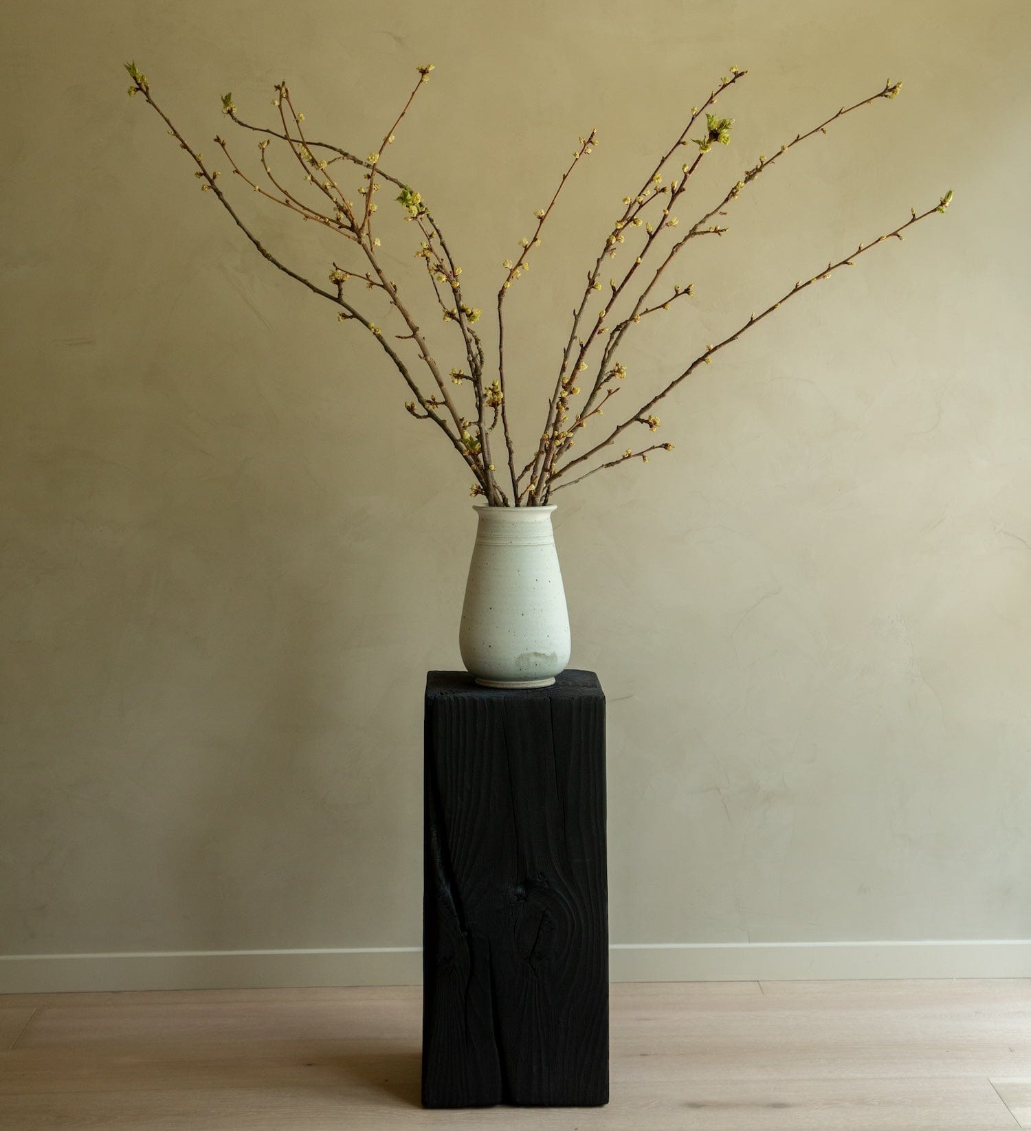 Charcoal Sculpture Pedestal - Medium by House of Leon shown styled with vase