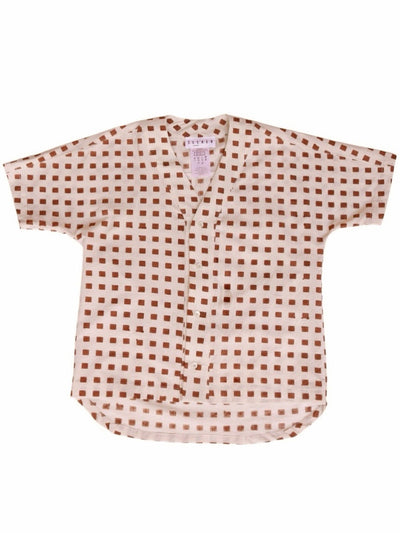 Front product view of the cream baseball shirt with rust-red hand-block-printed squares.