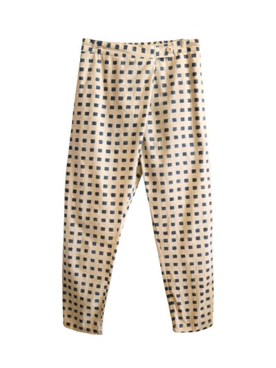 Front product view of cream Souk pants with indigo hand-block-printed squares.