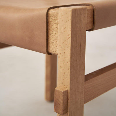 Close-up of natural leather seat on Shinto dining chair