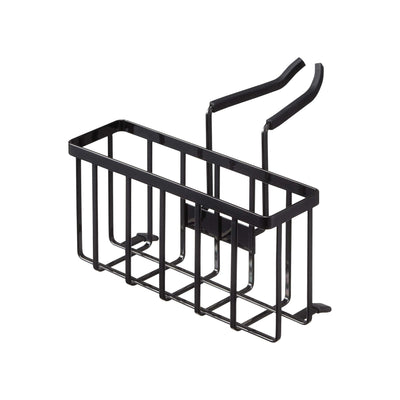 Empty black Yamazaki Home Faucet-Hanging Sponge Caddy - Steel isolated on white, showing its open rectangular basket, spaced wire bars, twin bent support arms and small projecting side hooks.