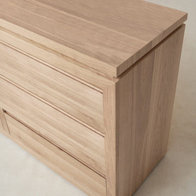 Side view of Sofita dresser showing solid oak frame and craftsmanship