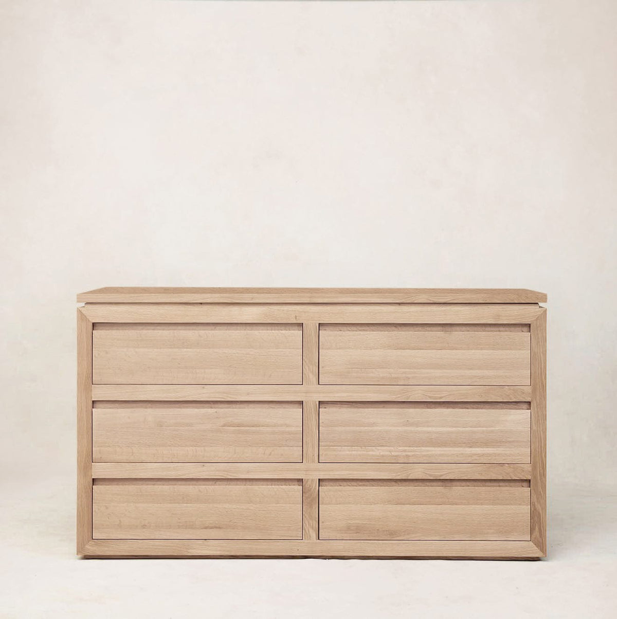 Front view of Sofita dresser highlighting clean lines and oak grain