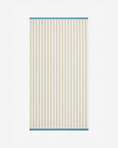 Full view of the reverse side, featuring a cream background with narrow beige vertical stripes and blue trim at both ends.