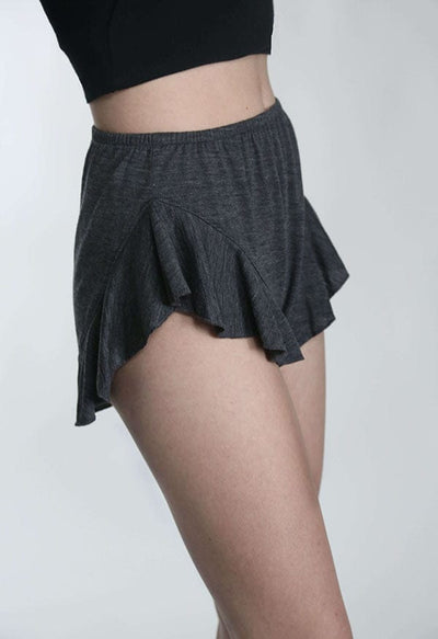 Close-up view of merino wool sauna shorties featuring a flowing silhouette, soft drape, and lightweight natural wool comfort.