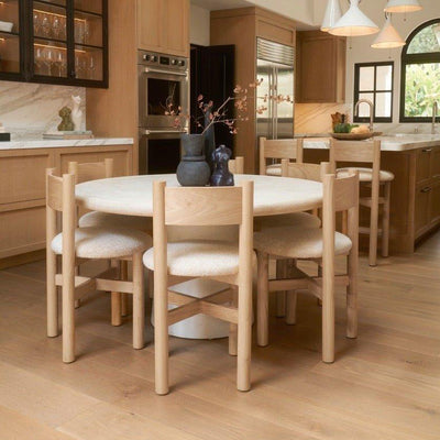 Teddy Dining Chair - Natural in a shared dining and kitchen space