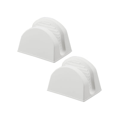 Two white Yamazaki Home Magnetic Pot Holders - Set of 2 - Silicone isolated on white, showing rounded triangular sides, open centres and ridged gripping surfaces.