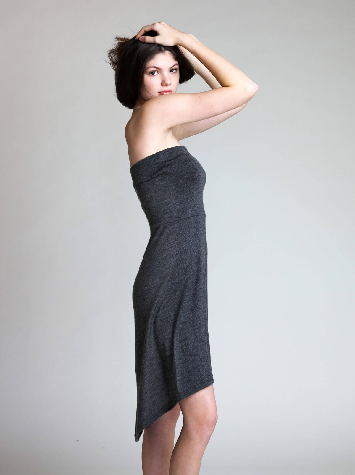 Convertible merino wool dress showcasing graceful movement, soft drape, and minimalist styling.